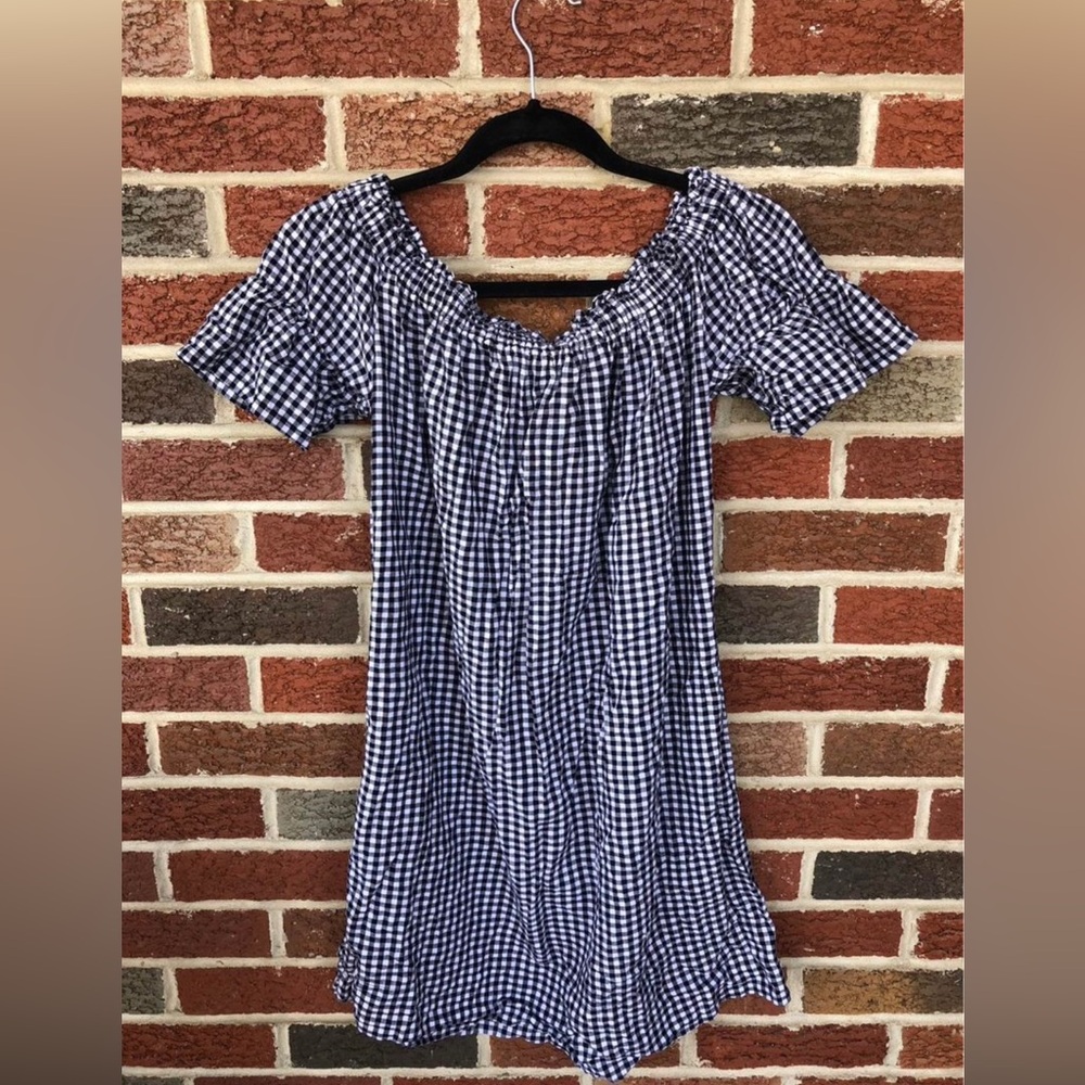 Off the shoulders, black and white gingham dress. Size is a medium.